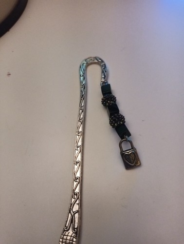 Metal bookmark with - with,